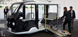 Den elektriske minibus kan transportere op til fire sportsudøvere ved OL. Den kan medbringe en kørestol, når den også skal bruges under De Paralympiske Lege.