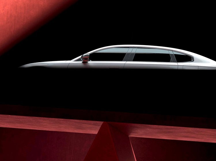Volvo ES90 i mørk silhuet.